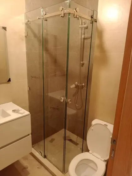 Cabine de douche d’angle en verre à portes pliantes